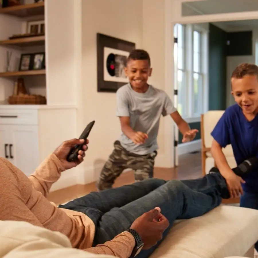 Family relaxing in a clean home
